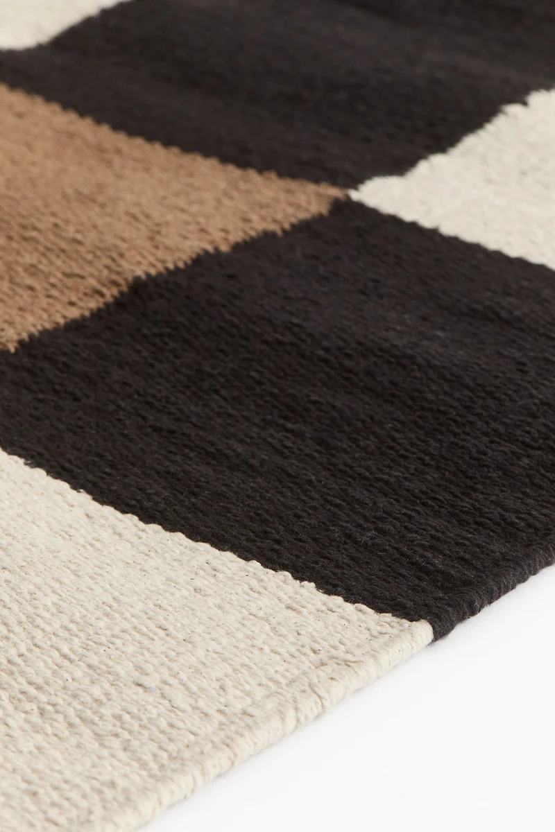 H&M Large checked cotton rug