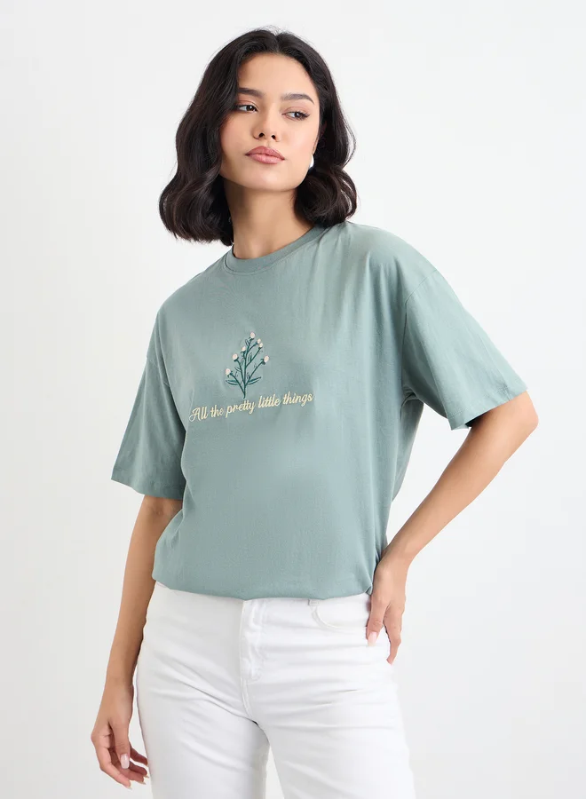 ستايلي Styli Embroidered Slogan Short Sleeves Oversized T-Shirt