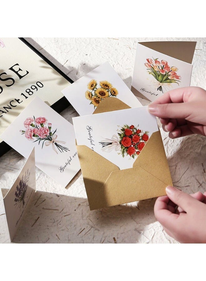 أربع مجموعات من بطاقات المعايدة بتصاميم زهرية مع أظرف وملصقات. - Image 3