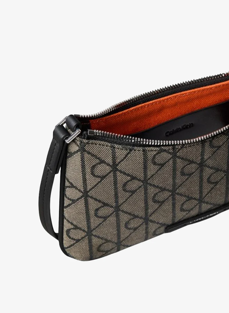 Calvin Klein Lotus Beige/Black AOP JQD Emblem Jacquard Convertible Crossbody Bag for Women | Best Price UAE