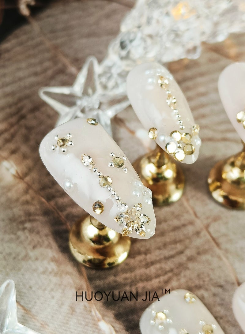 HUOYUAN JIA 10 Pieces Handmade Press On Nails,Reusable and Removable Almond Shape False Nails,Pearl Like Surface Decoration with Golden Rhinestones,Comes with A Rubbing Strip and A Piece of Jelly Glue for Fashionable Women's Holiday Gifts,False Nail Set  - Image 1