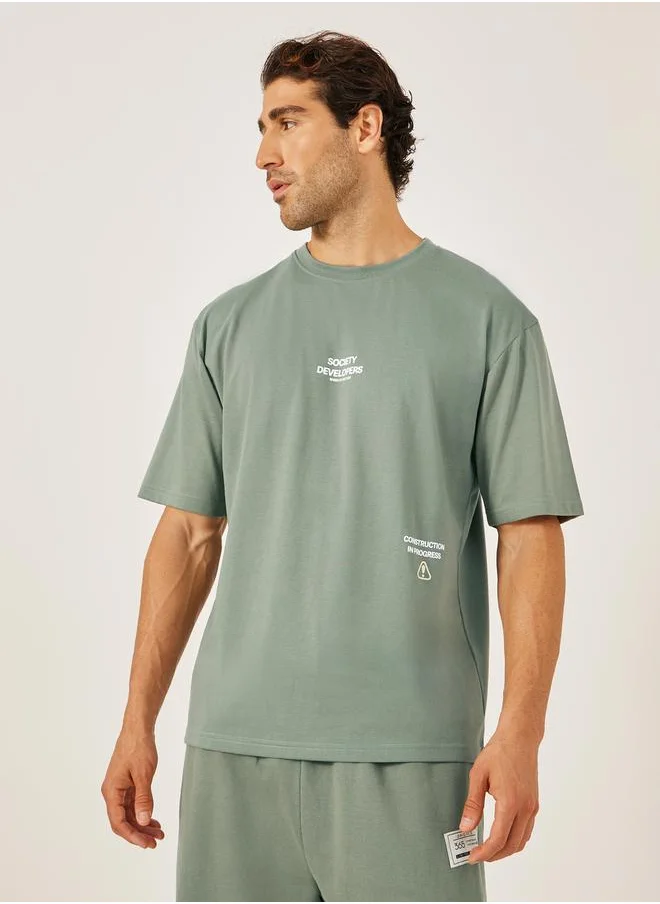 ستايلي Slogan Front and Back Print Oversized T-Shirt