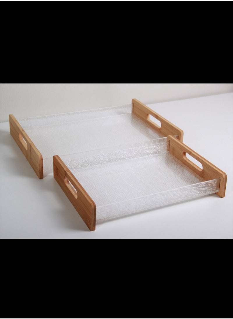 A set of trays offering a luxurious, versatile, elegant and sophisticated design.