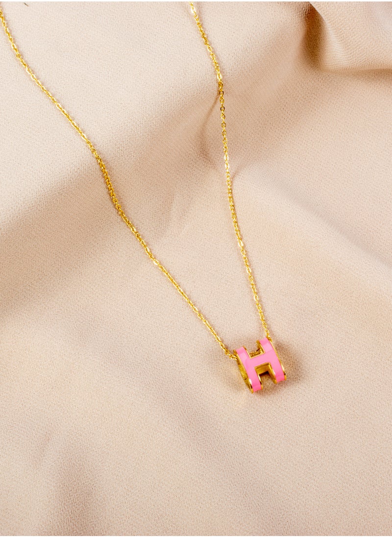 The Black Pearl Accessories - Stainless Steel necklace with H Pink pendant - Image 1