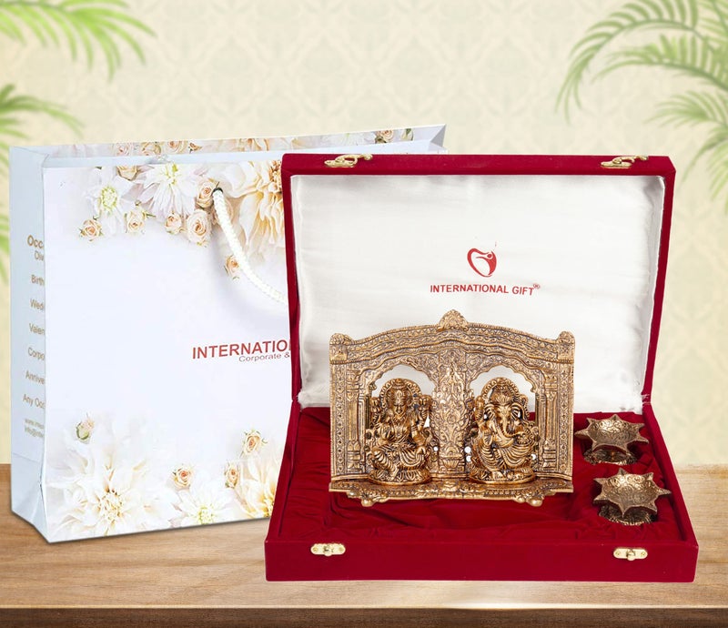 INTERNATIONAL GIFT® Copper Plated Laxmi Ganesh God Idol Statue Oxidized Finish with 2 Piece Jyot with Beautiful Velvet Box Packing and with Carry Bag (15H x 20W x 4.5L Centimeters) - Image 1