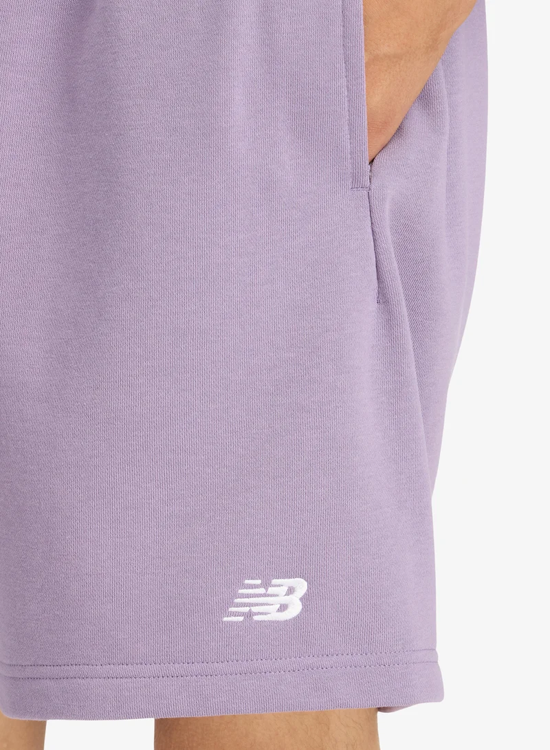 New Balance CANDIED VIOLET (AA5) 7" Essential French Terry Shorts for Men | Best Price UAE