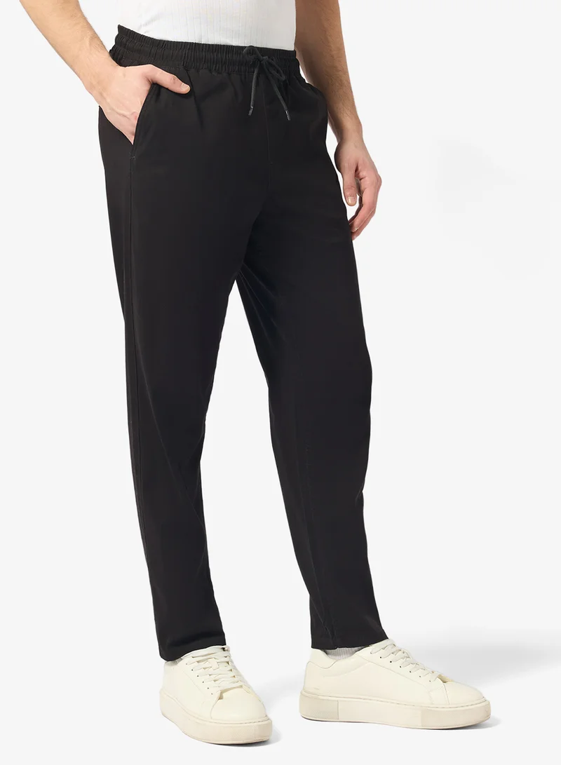 جاك اند جونز بنطلون رياضي كاجوال بخصر مطاطي وحافة مفتوحة