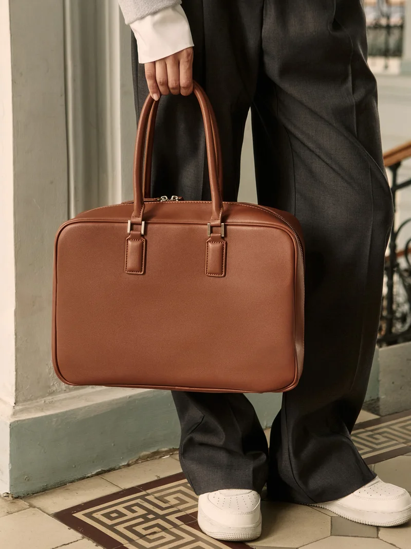 Rectangular eco-leather bag with short handles