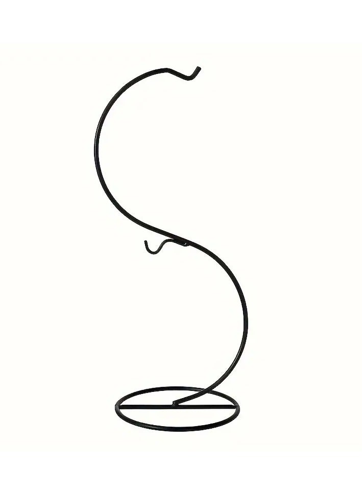 Generic Only one piece, which is a wired metal holder in black color sold separately without a glass ball vase, glass lantern, plant basin, flowers, fish or glass charming balls is a fixed and durable wire iron hook holder and the round metal base keeps the pot stable and safe The decorative vase holder does not sway or fall thanks to the creative design and the modern idea in which you put a special glass ball pot for hanging to decorate the garden or The balcony or by the window or on your desk Some put a small golden or orange fish in it, others put plants, some mini garden, and some a luminous candle as desired and its design enters with most home decorations The piece is the holder without the pot - Image 2