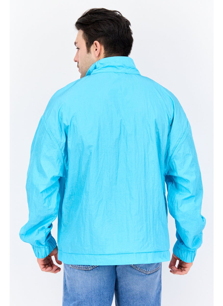 Men Solid Windbreaker Jacket, Turquoise - pzsku/Z2690B6548A36F9A007EAZ/45/_/1737641915/6e377444-ba76-466a-9d50-0de90a807c1b