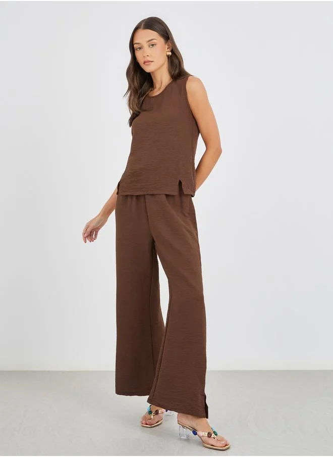 ستايلي Styli Solid Sleeveless Top and Wide Leg Pants Co-Ords