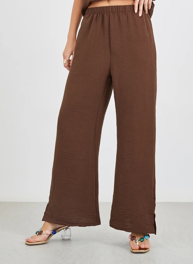 ستايلي Styli Solid Sleeveless Top and Wide Leg Pants Co-Ords