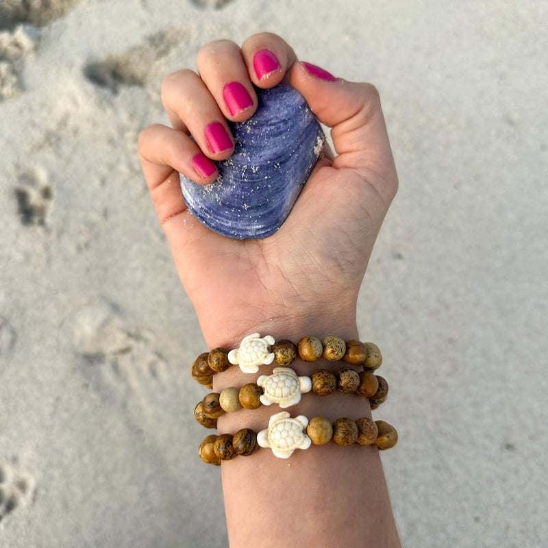 Fahlo Sea Turtle Tracking Bracelet â€“ Track a Real Sea Turtleâ€™s Journey â€“ Supports Wildlife Conservation â€“ Elastic, One Size Fits Most â€“ on Interactive Mobile App Map â€“ Unisex Ocean Conservation Gift (Sky Stone) - Image 4