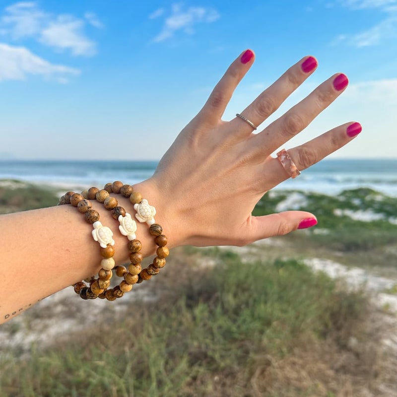 Fahlo Sea Turtle Tracking Bracelet â€“ Track a Real Sea Turtleâ€™s Journey â€“ Supports Wildlife Conservation â€“ Elastic, One Size Fits Most â€“ on Interactive Mobile App Map â€“ Unisex Ocean Conservation Gift (Sky Stone) - Image 2