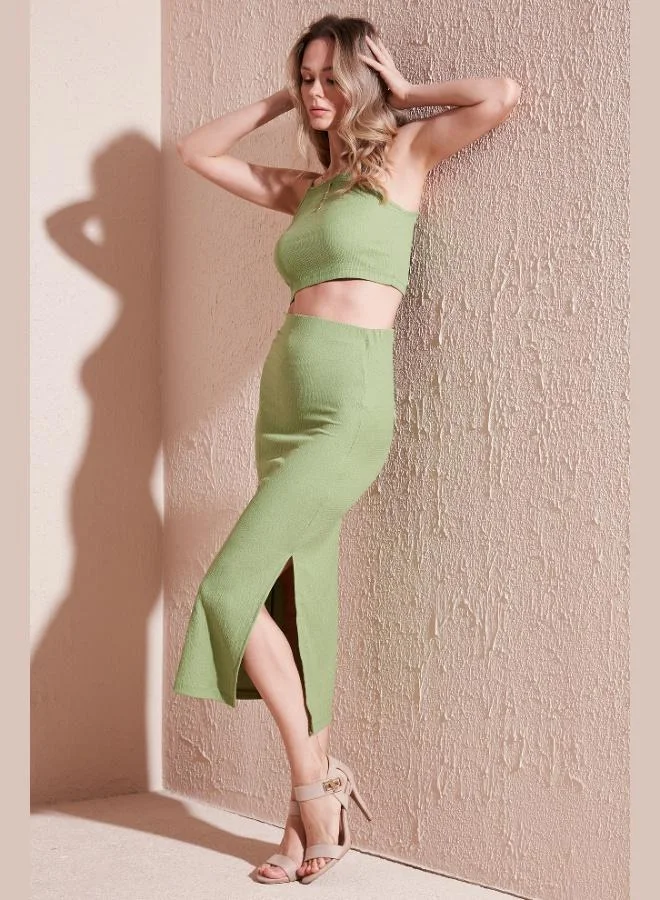 ليلا طقم نسائي ليلا بقصة ضيقة وحمالات بحبل وفتحة