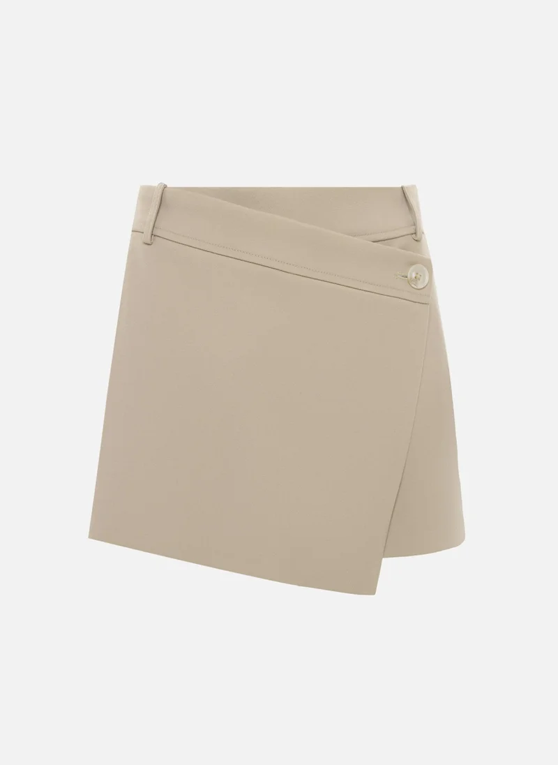 Lichi Mini eco-suede skirt-shorts with asymmetrical button fastening