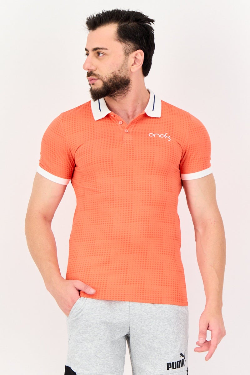 Puma x One8 Men Slim Fit Short Sleeves Outdoor Polo Shirt, Orange - Image 1