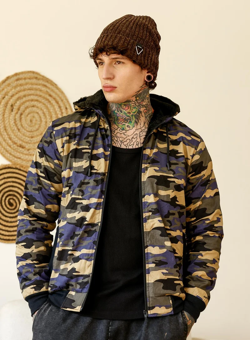 Campus Sutra Men's Camouflage Fleece-Lined Jacket | Hooded Neck , Long Ribbed Cuff Sleeves , Zipper Closure , Ribbed-Straight Hem | Abstract Print Woven Plain For Casual & Daily | Green & Beige