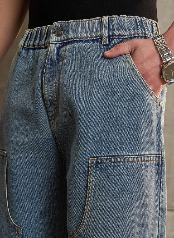ساسافراس جينز كاربنتر واسع الأرجل مغسول