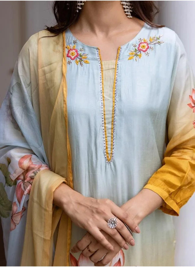 ISHIN Palazzo Women Sky Blue Muslin Kurta Set with Embroidered pattern Tunic and Palazzo features a Round neckline and Three-Fourth Sleeve secured with Elastic closure and styled in Straight Fit ideal for Festive moments — a must-have for your statement wardrobe.