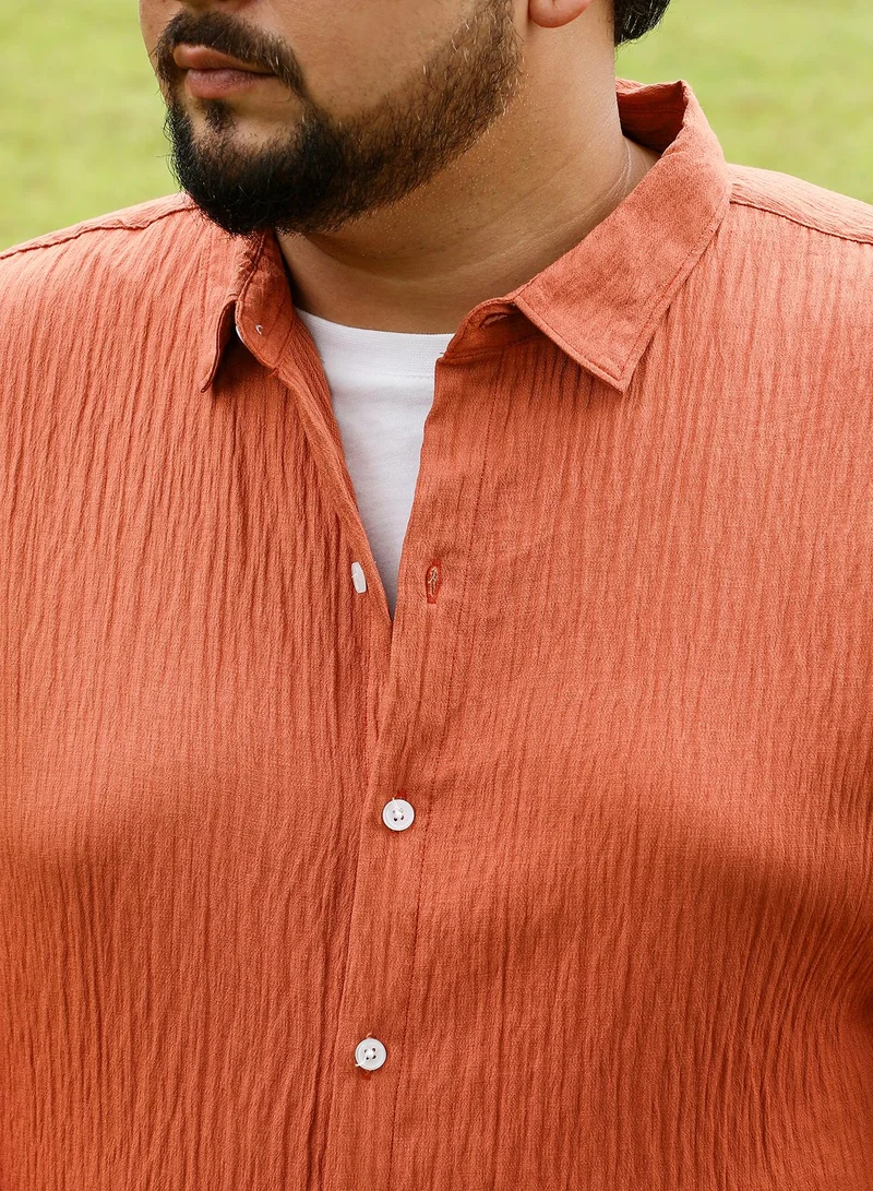 Instafab Plus  Instafab Plus Men Solid Creased-Tactile Shirt | Spread Collar , Long Cuffed Sleeves | Button Closure , - Hem | Solid Textured | Woven Fabric For Casual & Daily Wear | Saffron Orange for Men | Best Price UAE
