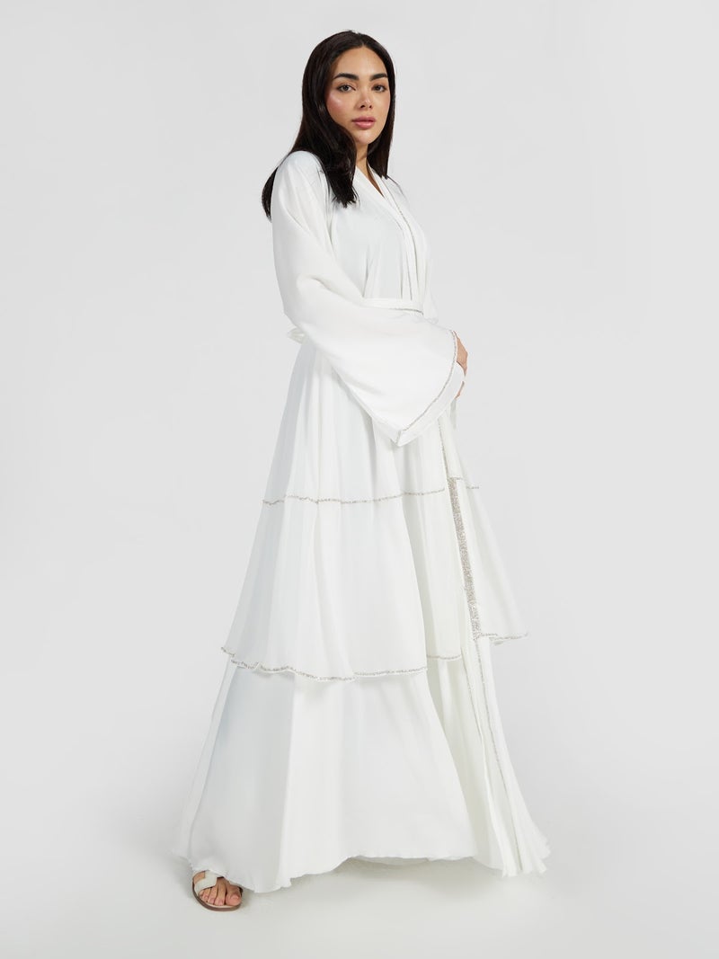 Reem Abayas Pure White Tiered Abaya with Silver Trim - Image 2