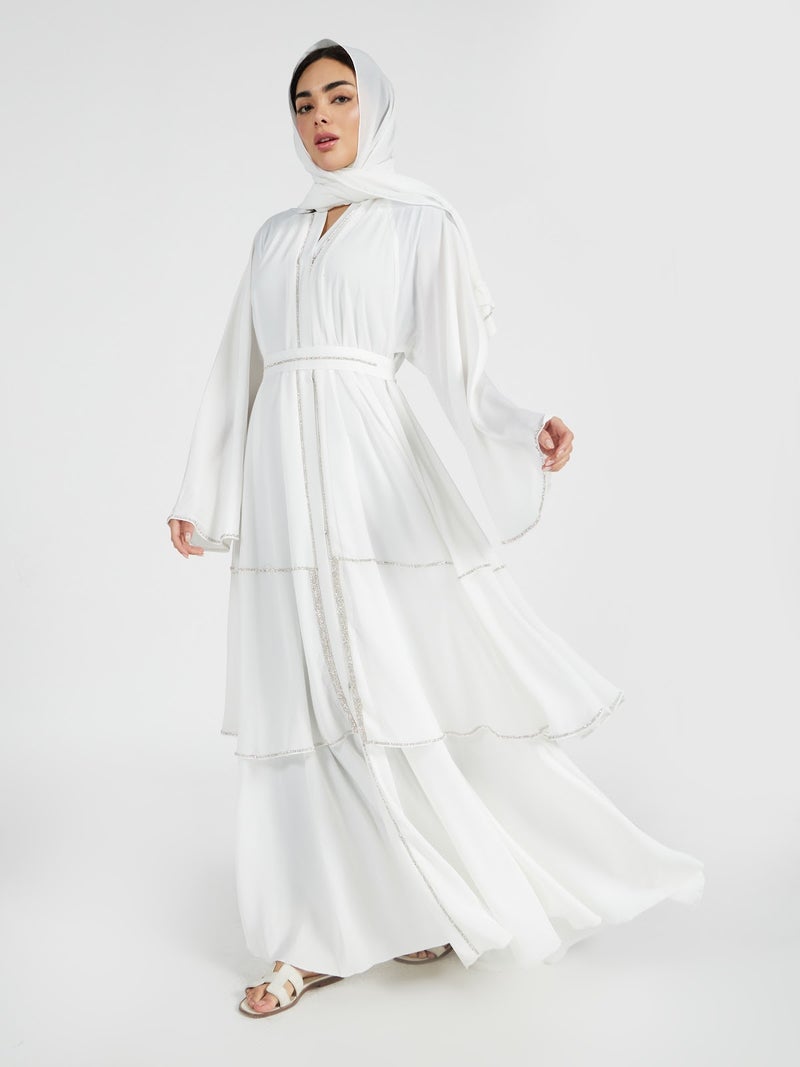 Reem Abayas Pure White Tiered Abaya with Silver Trim - Image 1