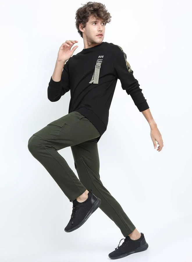 HIGHLANDER Solid Slim Fit Track Pants by Styli