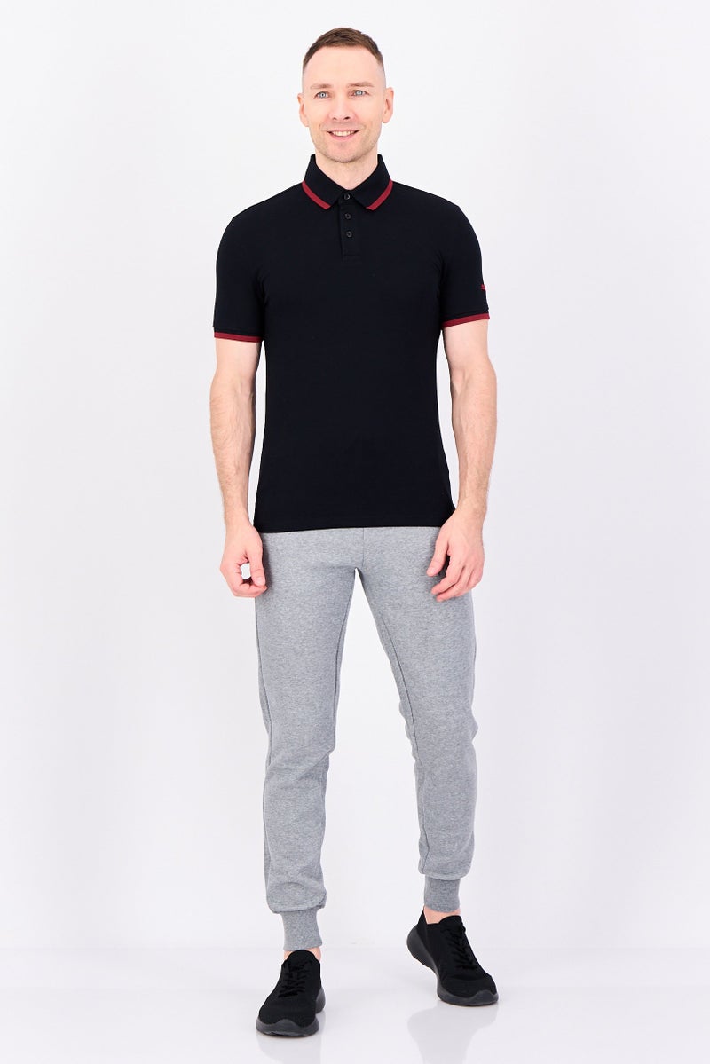 PUMA Men Slim Fit Short Sleeve Outdoor Polo Shirt, Black - Image 4