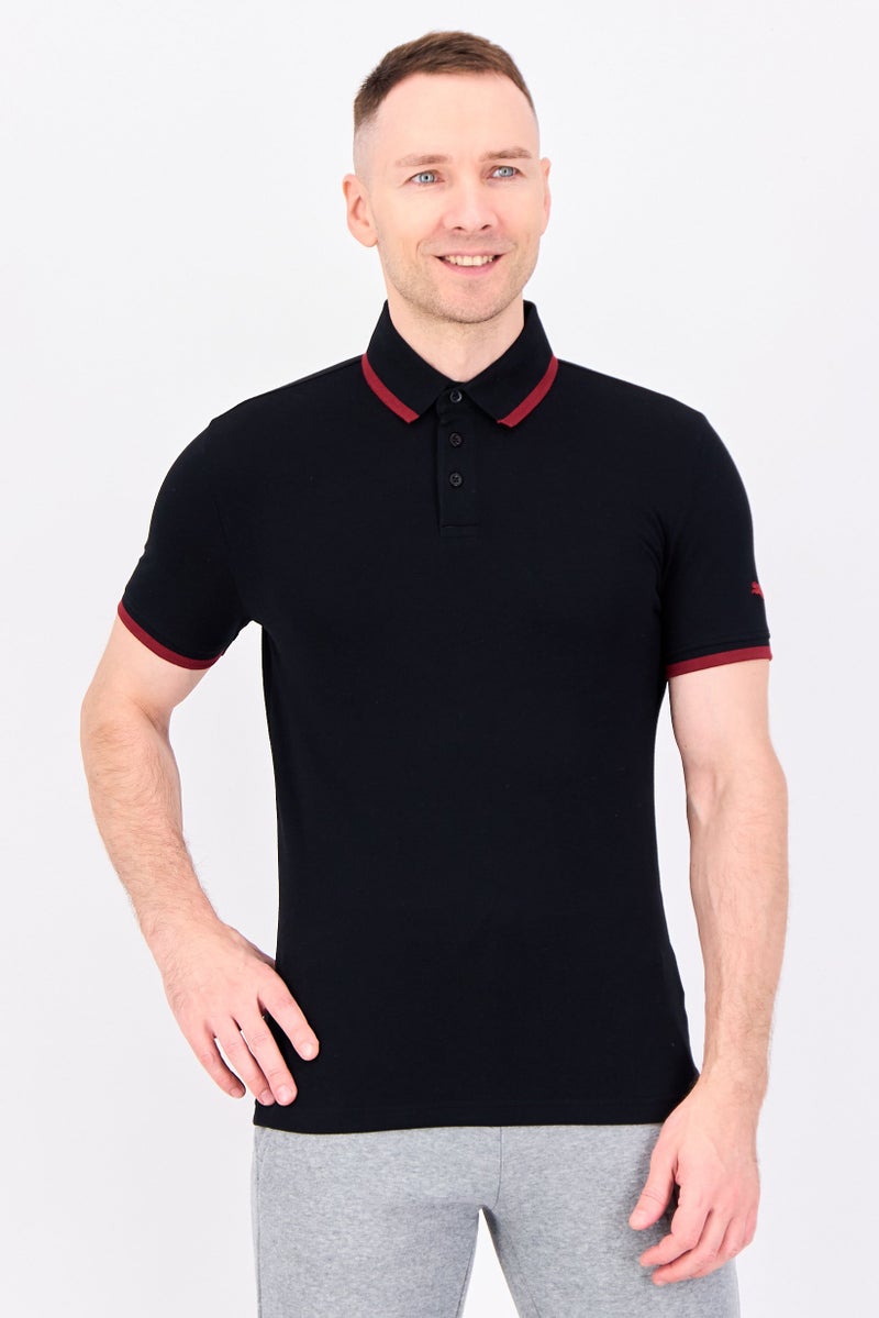 PUMA Men Slim Fit Short Sleeve Outdoor Polo Shirt, Black - Image 1