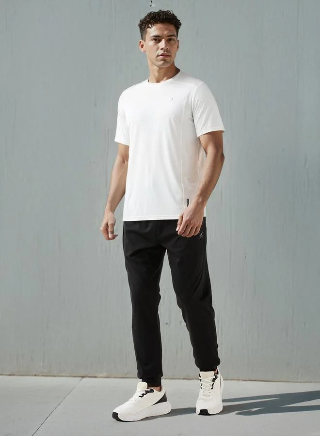 ادوت من سبلاش بنطلون رياضي بقصة عادية مع رباط وجيوب