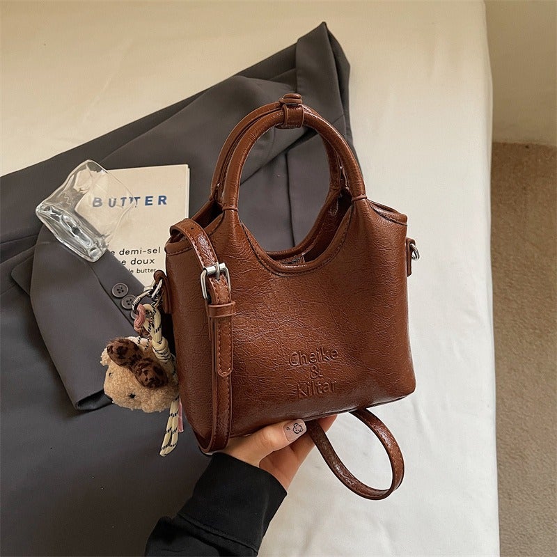 Simple bucket bag for women, new niche design, casual commuter shoulder bag, trendy and versatile crossbody bag. - Image 5
