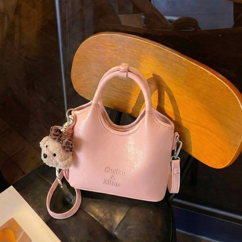 Simple bucket bag for women, new niche design, casual commuter shoulder bag, trendy and versatile crossbody bag. - Image 4