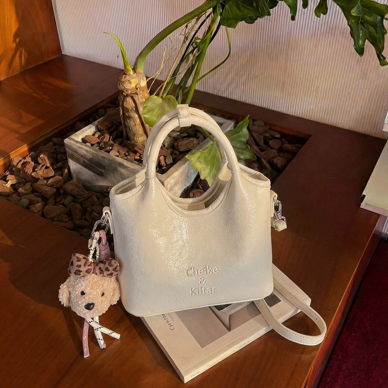 Simple bucket bag for women, new niche design, casual commuter shoulder bag, trendy and versatile crossbody bag. - Image 2