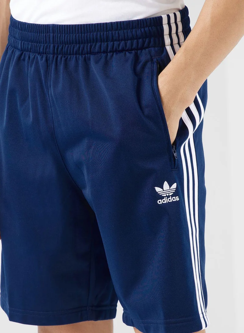 adidas شورت أزرق قصير رجالي من