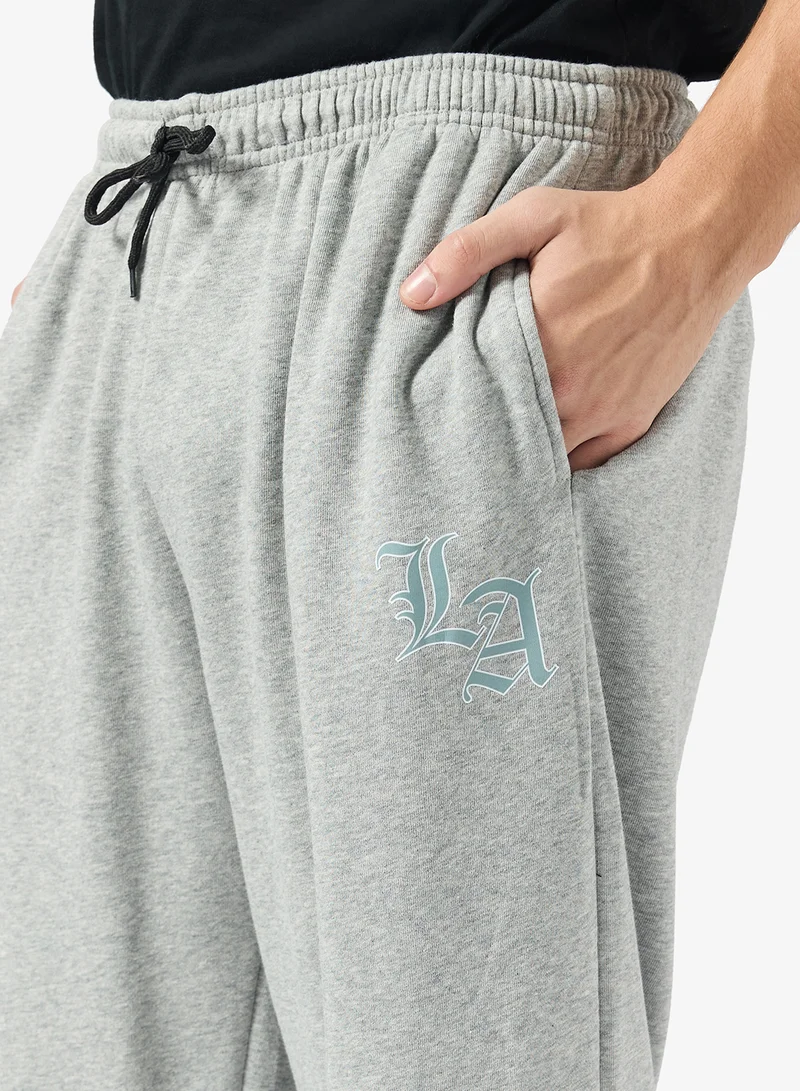Seventy Five Basics Logo Design Relaxed Joggers
