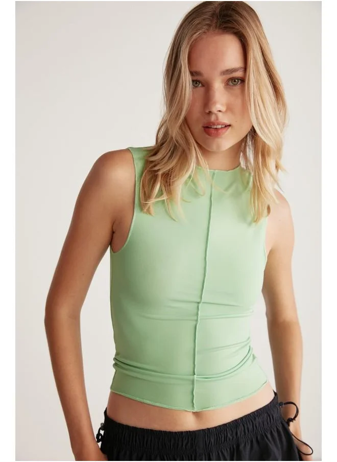 GRIMELANGE Grimelange Ginny Women's Sandy Stretch Fabric Open Hem Bodycon Sleeveless Green Blouse