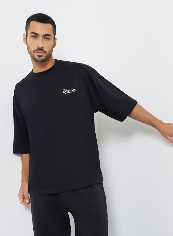 Styli Men Black Minimal Chest Print Oversized T-Shirt - Image 1