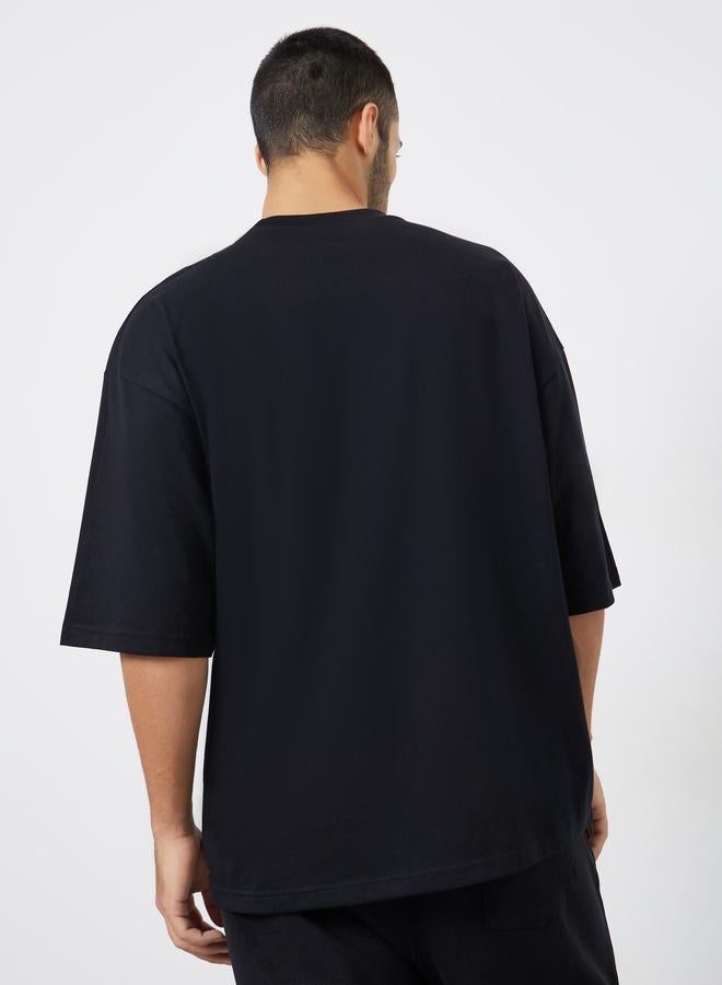 Styli Men Black Minimal Chest Print Oversized T-Shirt - Image 4