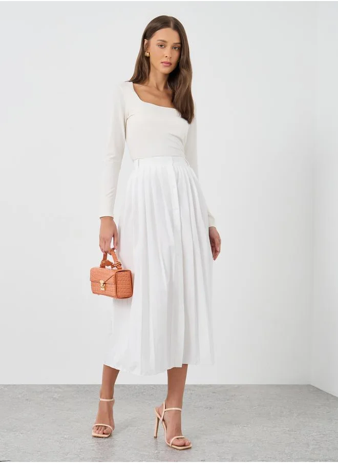 Styli Styli Solid Pleated A-Line Midi Skirt with Button Front