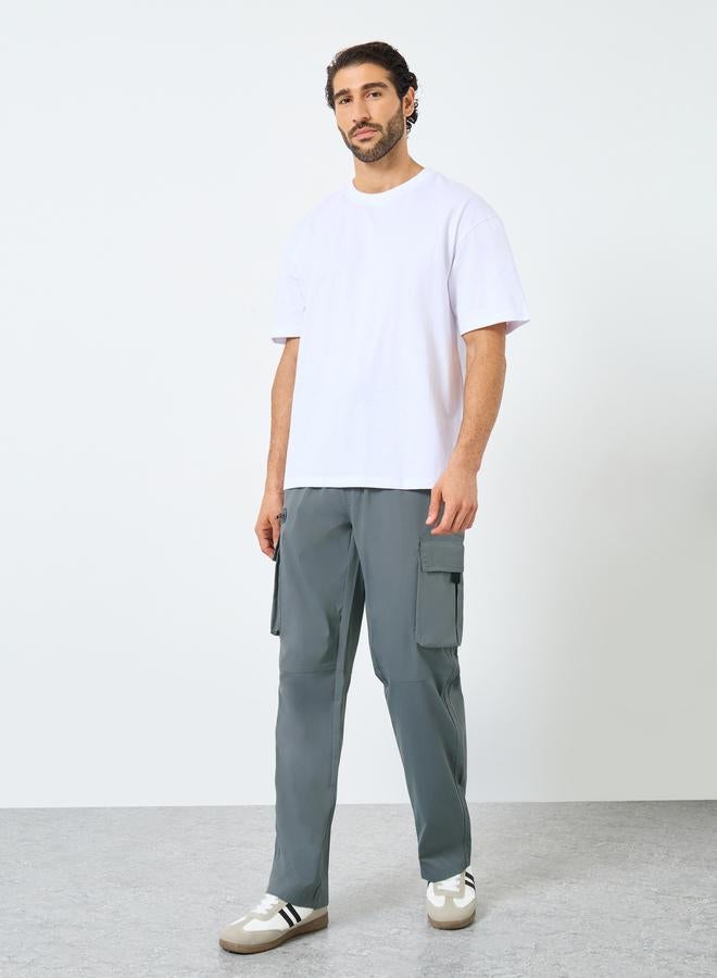 ستايلي بنطلون رياضي كارغو فضفاض منسوج بقطع متداخلة - Image 2