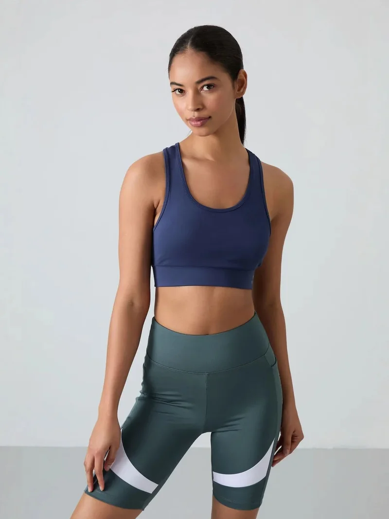 تومي لايف TOMMY Sleeveless Cropped Fitted Sports Top