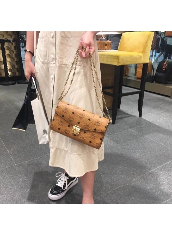 MCM Brown Monogrammed Chain Crossbody Bag with Gold-tone Lock and Adjustable Chain Strap