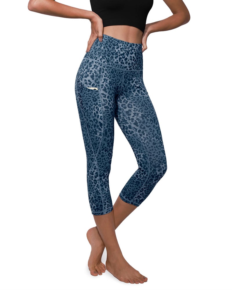 ODODOS Women's High Waisted Pattern Yoga Capri Leggings with Pockets, Tummy Control Non See Through Sports Athletic Workout Running Capris, Blue Leopard, Medium - Image 1