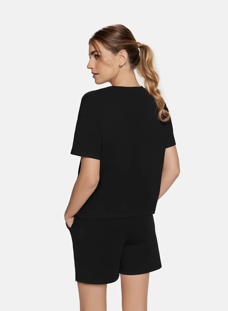 Cardio Bunny  Cardio Bunny Relaxed Logo Tee - Black for Women | Best Price UAE