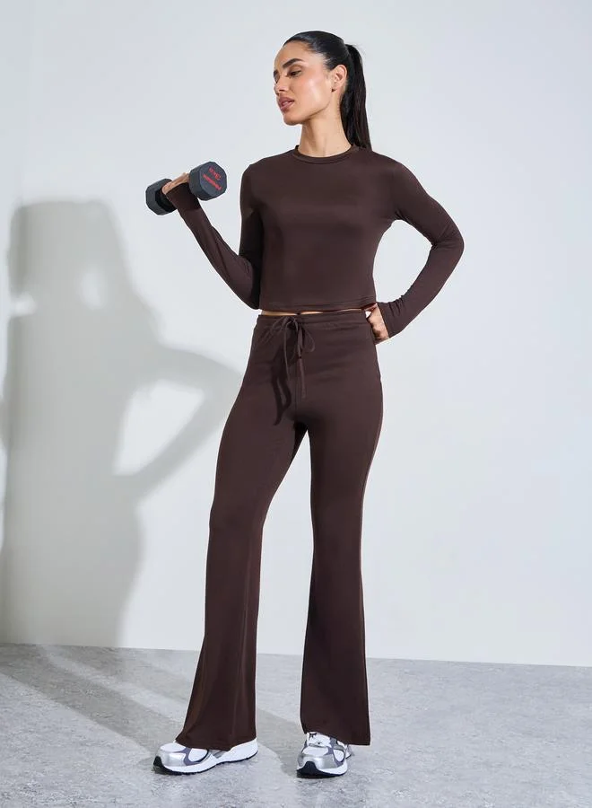 Brown Solid Long Sleeves Crop Top And Flared Leggings Active Set