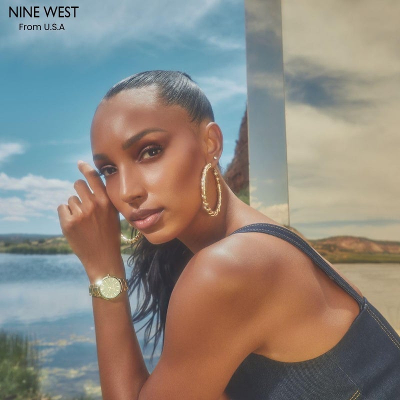 NINE WEST ساعة نسائية من ناين ويست بقرص شمسية وسوار شبكي - Image 2
