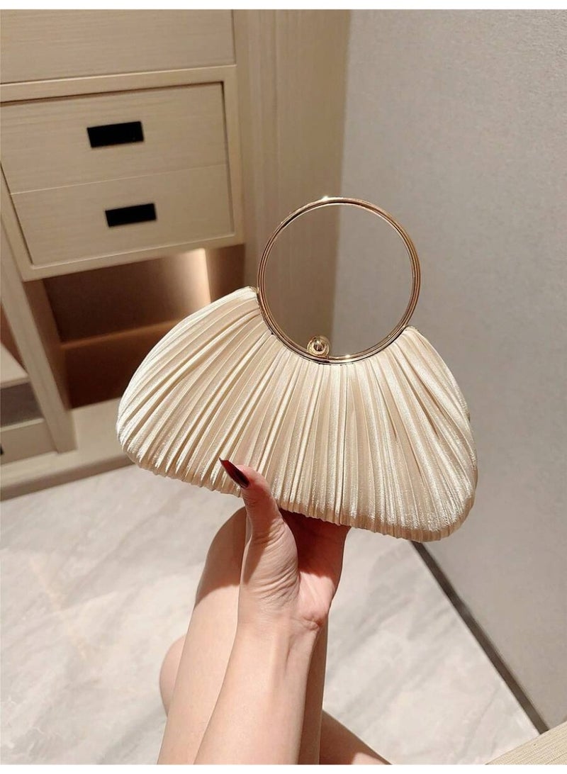 شنطة سهرة نسائية كلتش بلون كريمي بتصميم صدفي مع مقبض دائري معدني مناسبة للحفلات والمناسبات - Image 1