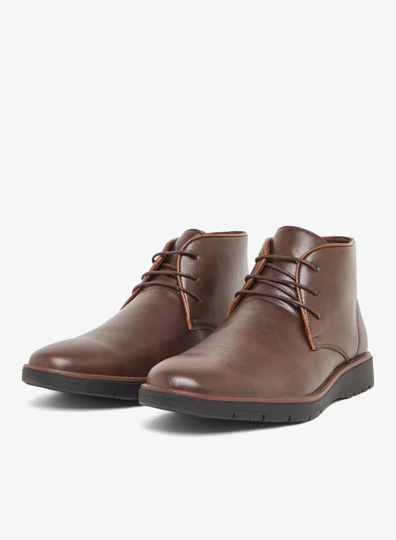 ستايلي حذاء بوت تشوكا جلد