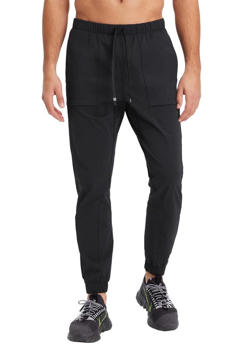 Fabletics Men's The One Jogger, Quick-Dry, Hidden Pockets, Zip Pockets, UPF Protection, Anti-Stink, Lightweight, L/Regular 29 in | 29, Black - Image 1